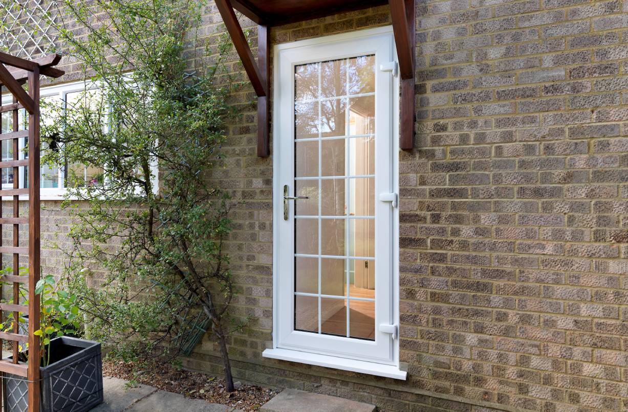 A white uPVC back door with double glazing